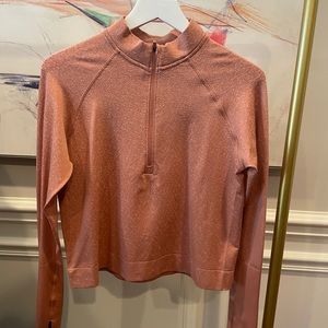 Lululemon Rest Less Cropped half zip (peach/ pink color with white flecks). EUC